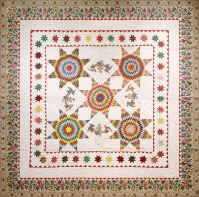Mary Seeds Moon - Lone Star Appliqued Chintz and Pieced Quilt, ca. 1840